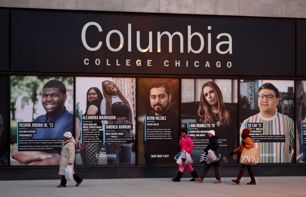 People walk by Columbia College Chicago's 600 S. Michigan Ave. building in the South Loop on Dec. 13, 2024. (Chris Sweda/Chicago Tribune)