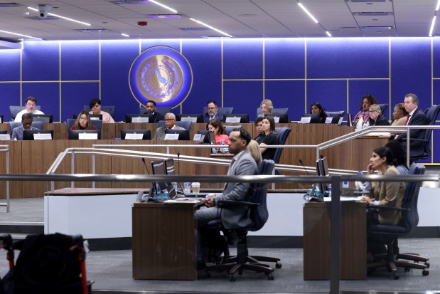 CPS President Pedro Martinez and members of the Board of Education and listen to speakers during a Chicago Public Schools board meeting at the CPS headquarters on Feb. 27, 2025. (Antonio Perez/Chicago Tribune)