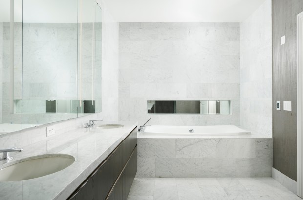 This three-bedroom, two-and-a-half-bath home in The Residences at The St. Regis Chicago recently went on the market for almost $3 million. (RM Luxury Group)