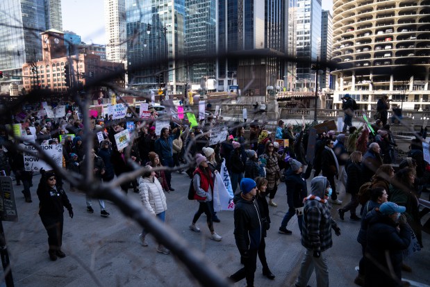 People march to Trump Tower for International Women's Day on March 8, 2025. (Audrey Richardson/Chicago Tribune)