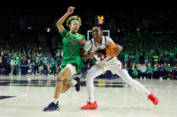 Notre Dame Fighting Irish guard Hannah Hidalgo (3) guards Louisville Cardinals guard Tajianna Roberts (22) during the first quarter at Purcell Pavilion in South Bend on Sunday, March 2, 2025. (Eileen T. Meslar/Chicago Tribune)