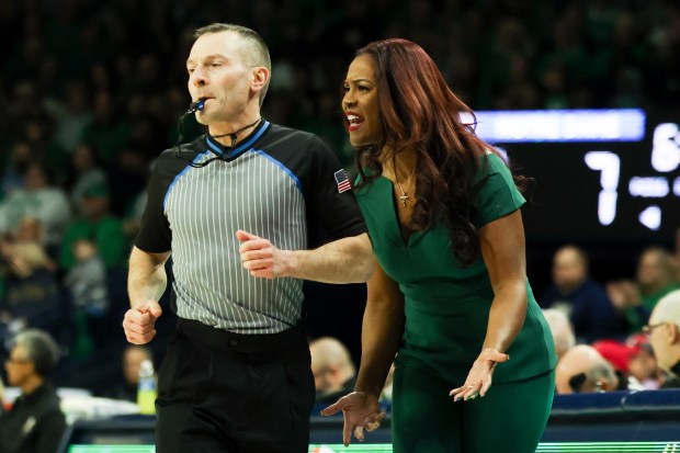 Notre Dame Fighting Irish guard Head Coach Niele Ivey yells to players during the first quarter of their game against the Louisville Cardinals at Purcell Pavilion in South Bend on Sunday, March 2, 2025. (Eileen T. Meslar/Chicago Tribune)