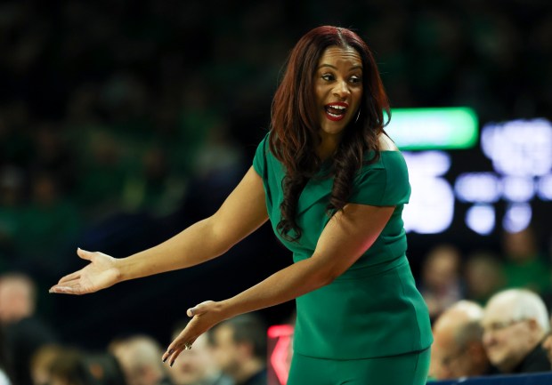 Notre Dame Fighting Irish guard Head Coach Niele Ivey yells toward the bench during the second quarter of their game against the Louisville Cardinals at Purcell Pavilion in South Bend on Sunday, March 2, 2025. (Eileen T. Meslar/Chicago Tribune)