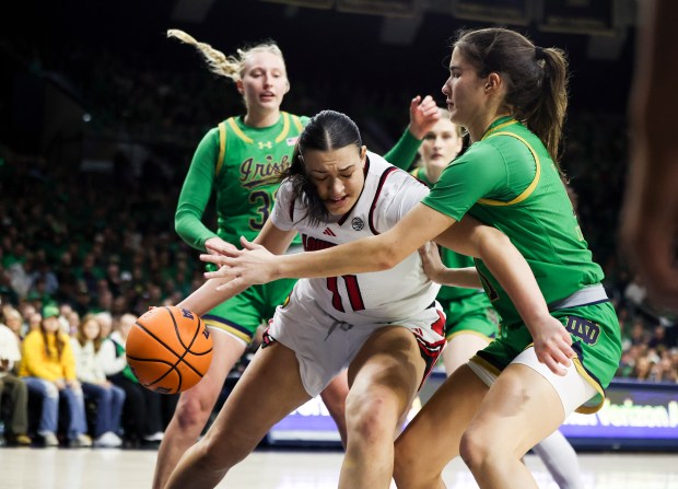 Notre Dame Fighting Irish guard Sonia Citron (11) guards Louisville Cardinals forward Elif Istanbulluoglu (11) during the first quarter at Purcell Pavilion in South Bend on Sunday, March 2, 2025. (Eileen T. Meslar/Chicago Tribune)