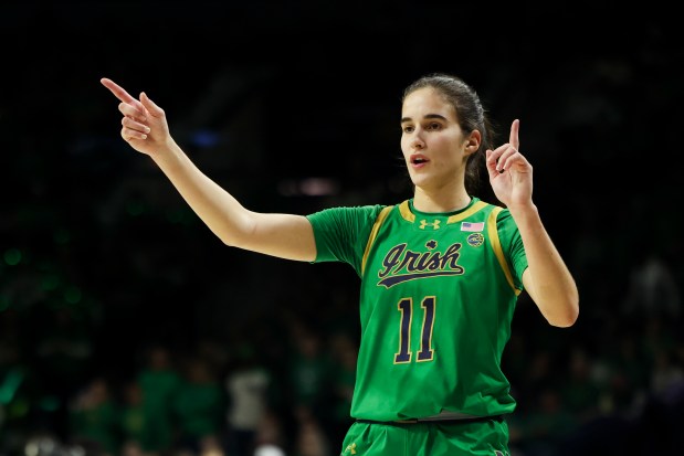 Notre Dame Fighting Irish guard Sonia Citron (11) speaks to her teammates during the third quarter at Purcell Pavilion in South Bend on Sunday, March 2, 2025. (Eileen T. Meslar/Chicago Tribune)