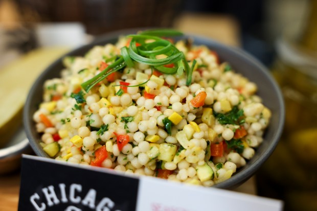 Seasonal Roasted Vegetable Couscous Salad is displayed during media preview at the White Sox team store on Wednesday, March 19, 2025. The salad will be available in the Stadium Club Bar. (Eileen T. Meslar/Chicago Tribune)