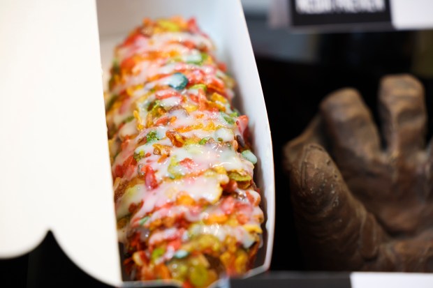 Lucky's Korean Dogs "Unicorn," which contains marshmallows, Fruity Pebbles, and sweet condensed milk, is displayed during the media preview at the White Sox team store on Wednesday, March 19, 2025. This will be offered in Section 154 at Rate Field. (Eileen T. Meslar/Chicago Tribune)