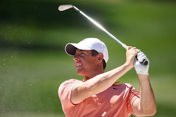 Rory McIlroy of Northern Ireland plays a shot on the eighth hole prior to THE PLAYERS Championship on the Stadium Course at TPC Sawgrass on March 12, 2025 in Ponte Vedra Beach, Florida. (Photo by Jared C. Tilton/Getty Images)