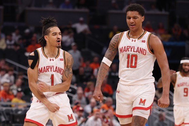 Maryland's Rodney Rice (1) and Julian Reese celebrate against Illinois during the first half of a Big Ten Tournament quarterfinal at Gainbridge Fieldhouse on March 14, 2025, in Indianapolis. (Michael Reaves/Getty Images)