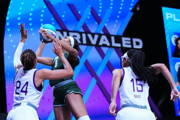 Rose's Angel Reese goes up for a shot against the Lunar Owls' Napheesa Collier during an Unrivaled game on Feb. 21, 2025 in Medley, Fla. (Rich Storry/Getty Images)