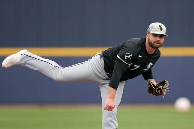 Chicago White Sox starting pitcher Bryse Wilson throws against the Milwaukee Brewers during the second inning of a spring training baseball game Wednesday, March 5, 2025, in Phoenix. (AP Photo/Ross D. Franklin)