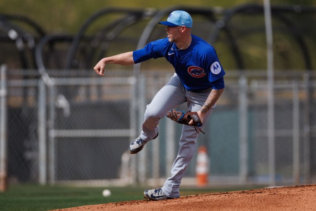 Cubs reliever Ryan Pressly throws during live batting practice at spring training on Feb. 16, 2025, at Sloan Park in Mesa, Ariz. (Armando L. Sanchez/Chicago Tribune)