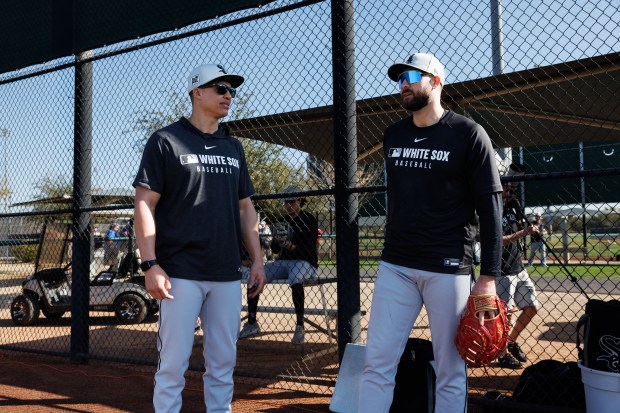 White Sox manager Will Venable talks with outfielder/first baseman Joey Gallo during spring training at Camelback Ranch on Feb. 18, 2025, in Glendale, Ariz. (Armando L. Sanchez/Chicago Tribune)