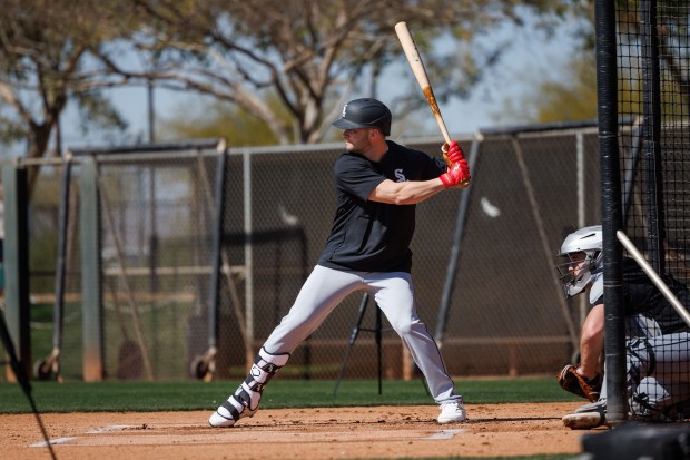 White Sox left fielder Andrew Benintendi stands at the plate during live batting practice at Camelback Ranch on Feb. 18, 2025, in Glendale, Ariz. (Armando L. Sanchez/Chicago Tribune)