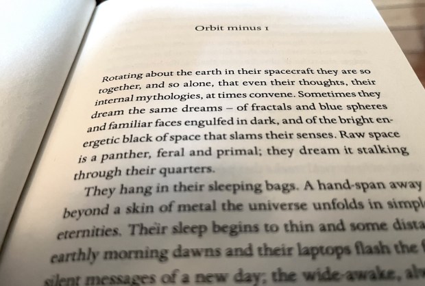 The first page of "Orbital" by Samantha Harvey, published by Atlantic Monthly Press. The type size of the U.S. edition is larger than that of the U.K. edition. (Tribune photo)