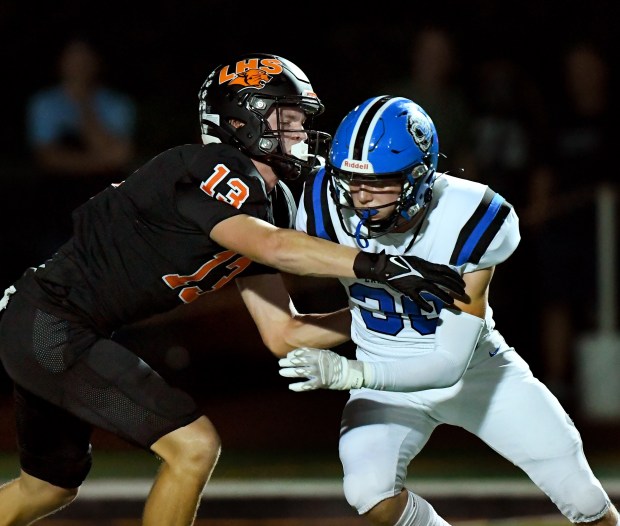 Libertyville's Brock Williams blocks