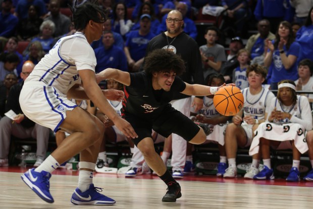 Benet's Jayden Wright drives against Quincy