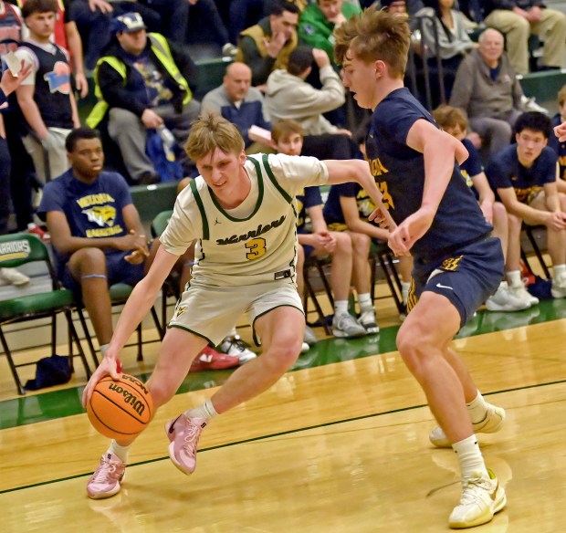 Waubonsie Valley's Cade Valek drives against Neuqua Valley's Cole Kelly