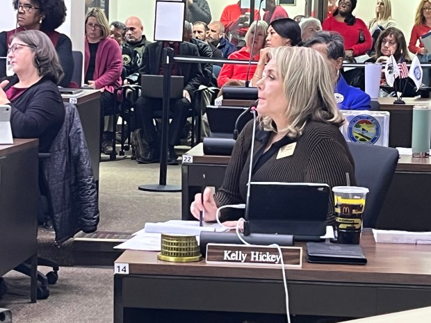 Will County Board member Kelly Hickey, a Naperville Democrat, listens to a plan Thursday to expand the AZ Hard Rock quarry in Bolingbrook. Hickey was one of 12 board members -- eight Republicans and four Democrats -- who voted to support the project. (Michelle Mullins/Naperville Sun)