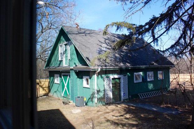 Today, 775 Mawman Avenue in Lake Bluff has undergone a contemporary transformation. It is a 3,050 square foot, five-bedroom, 3.5-bath, house, with a finished attic, a cellar, and full barn which conveniently doubles as a three-car garage, which is pictured here. The barn historically used by a past owner, (also the ice truck delivery man), as storage for the ice truck. (Gina Grillo/ for the Pioneer Press)