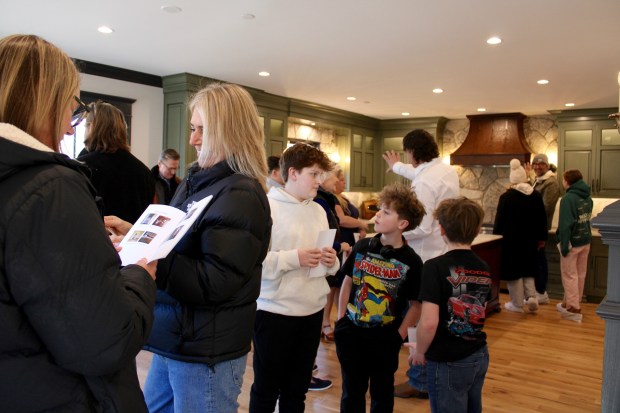 Friends and neighbors gathered for an open house on Sunday at 775 Mawman Avenue in Lake Bluff, to celebrate the recent renovations to the property. (Gina Grillo/ for the Pioneer Press)