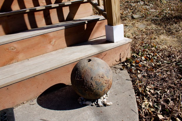 Sunday's open house event also featured a few treasures unearthed during the demolition of the house -- a gold tooth, a Daughters of American Revolution pin, a June 1903 issue of the Lake Forester, an old postcard, and a cannon ball, pictured here. (Gina Grillo/ for the Pioneer Press)