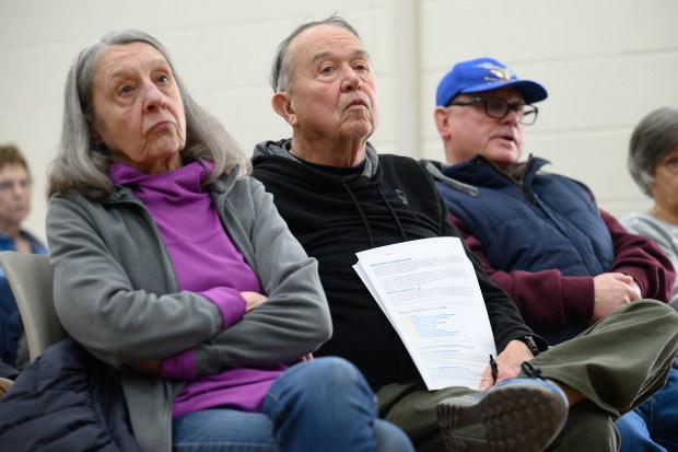 Visitors listen during a town hall meeting with State Rep. Mike Andrade, D-Munster, and State Senators Lonnie Randolph, D-East Chicago, and Dan Dernulc, R-Highland, in Highland on Saturday, March 8, 2025. (Kyle Telechan/for the Post-Tribune)