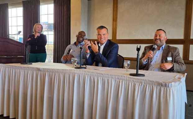 NWI Food Bank President and CEO Vic Garcia, far right, provides a bit of levity with Strack and Van Til CEO Jeff Strack, center right; Faith Farms Founder Rev. Curtis Whittaker, center left; and Legacy Foundation CEO Kelly Anoe during the Lake County Advancement Committee's bi-monthly talk at Avalon Manor in Hobart March 21, 2025. (Michelle L. Quinn/Post-Tribune)