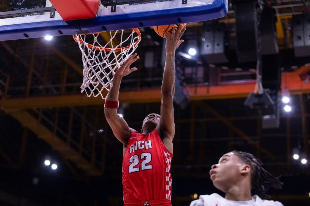 Rich Township's Von Ammons (22) lays the ball up against Kenwood during the Class 4A Illinois-Chicago Supersectional at Credit Union 1 Arena in Chicago on Monday, March 10, 2025. (Vincent D. Johnson / for the Daily Southtown)