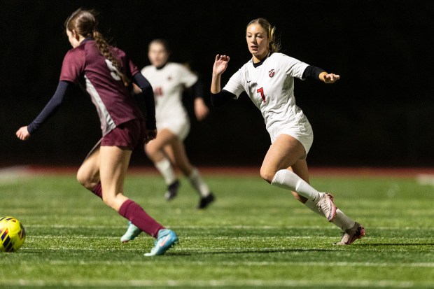 Lincoln-Way Central's Jaylin Sustr (7) tries to cut off Lockport's Juliana Reyes (5) during a Windy City Ram Classic second-round game in New Lenox on Thursday, March 20, 2025. (Vincent D. Johnson / for the Daily Southtown)