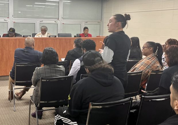 Guadalupe Gutierrez, who has family members within District 147, calls out the school board Feb. 3, 2025, for inaction after a teacher allegedly made comments about deportation to students. (Olivia Stevens/Daily Southtown)