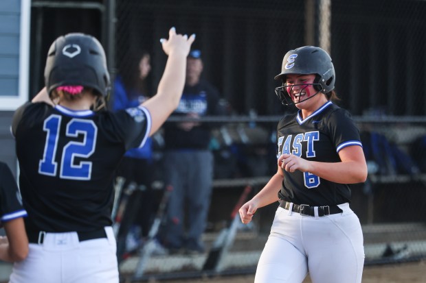 Lincoln-Way East's Cassidy Jagielski (6) heads home after hitting a three run home run against St. Laurence during a non conference game in Frankfort on Monday March 17, 2025. (Troy Stolt for the Daily Southtown)