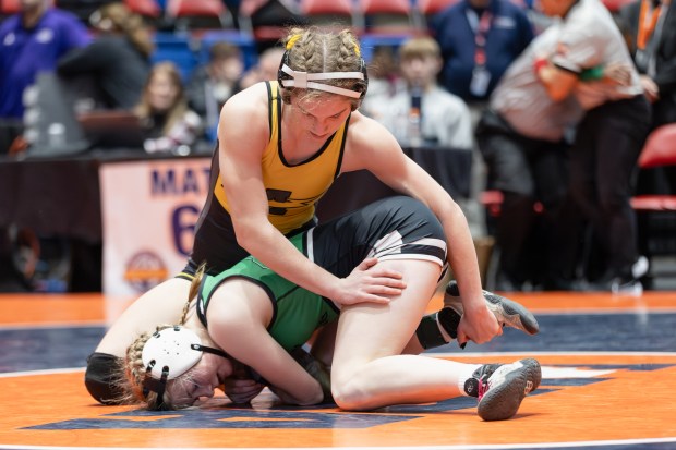 Andrew's Alyssa Keane wrestles Dwight's Avery Crouch during the 135 pound third place match of the IHSA girls wrestling individual state meet on in Bloomington on Saturday, March 1, 2025. (Troy Stolt / for the Daily Southtown)