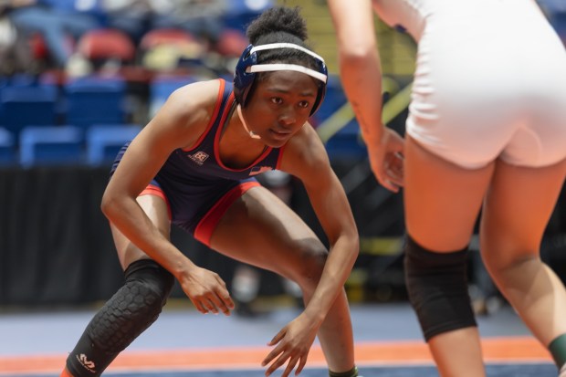 West Aurora's Kameyah Young wrestles Anna's Zoee Sadler during the 105 pound third place match of the IHSA girls wrestling individual state meet on in Bloomington on Saturday, March 1, 2025. (Troy Stolt / for the Beacon News)