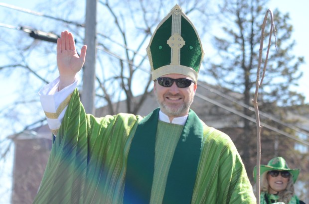 A man dressed as St. Patrick greets the thousands March 9, 2025, at the Tinley Park Irish Parade. (Jeff Vorva/for the Daily Southtown)