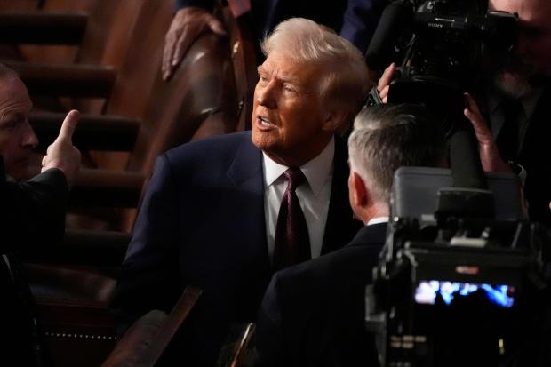 President Donald Trump departs after addressing a joint session of Congress at the Capitol in Washington, Tuesday, March 4, 2025. (AP Photo/Alex Brandon)