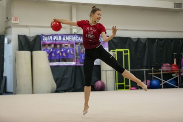 U.S. Olympic rhythmic gymnastics individual competitor Evita Griskenas trains on ball, July 1, 2021, in Deerfield.