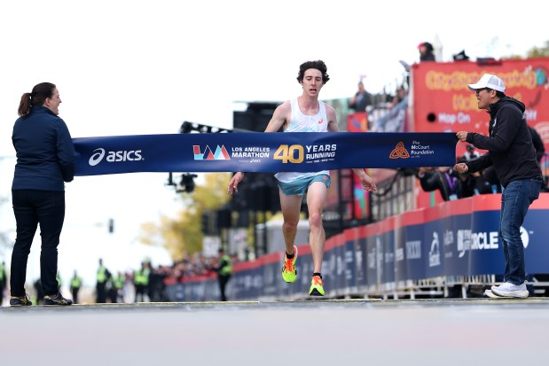 Matt Richtman of the United States crosses the finish line and wins the 2025 Los Angeles Marathon at Westfield Century City on March 16, 2025, in Los Angeles. (Luke Hales/Getty)