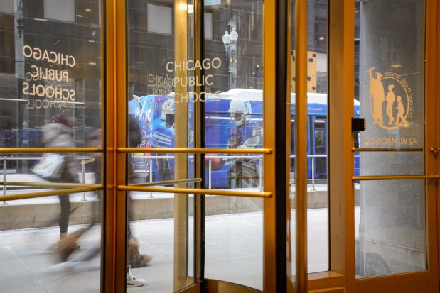 People walk past Chicago Public Schools headquarters on Jan. 30, 2025. (Audrey Richardson/Chicago Tribune)