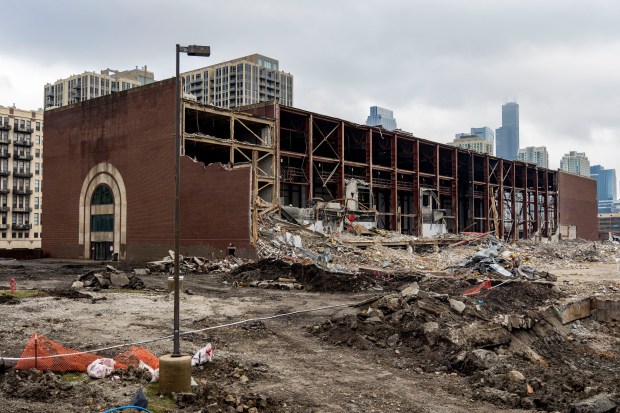 Demolition work takes place at the former Chicago Tribune Freedom Center in River West on Dec. 16, 2024, at the planned site of Bally's casino complex. (Brian Cassella/Chicago Tribune)