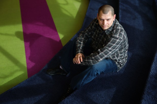 Aaron Bass, 39, at the Kankakee Public Library on Feb. 14, 2025, in Kankakee. (Stacey Wescott/Chicago Tribune)