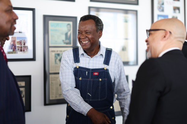 Willie Wilson chats with church leaders after a press conference at his home in the Loop on March 13, 2025, discussing influential church leaders' plans to meet with corporate leaders regarding diversity, equity and inclusion. (Eileen T. Meslar/Chicago Tribune)