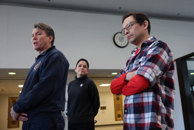 Chicago Fire Fighters Union Local 2 President Patrick Cleary, from left, with state Comptroller Susana Mendoza, and Ald. Ray Lopez, 15th, answer reporters' questions after attending the detention hearing for Charles Green, charged with arson and murder, at the Leighton Criminal Court Building on Saturday, April 26, 2025, in Chicago. Fire Department Capt. David Meyer died after responding to a fire that Green is charged with starting. (John J. Kim/Chicago Tribune)