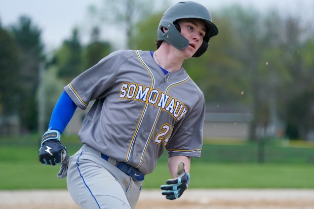 Somonauk's Noah Brandt runs out a fly ball during a nonconference baseball game against Plano at Somonauk High School on Friday, April 25, 2025. (Sean King / for The Beacon-News)