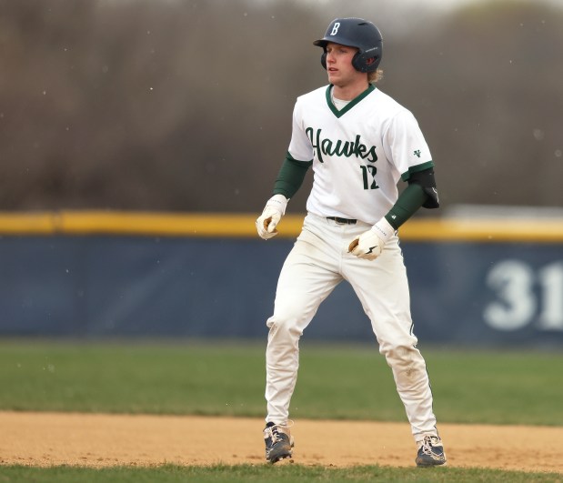 Bartlett's Vince Yario (12) takes his lead off of first after a base hit in the first inning against Streamwood during an Upstate Eight conference game in Bartlett on April 7, 2025.(H. Rick Bamman/for the Beacon-News)