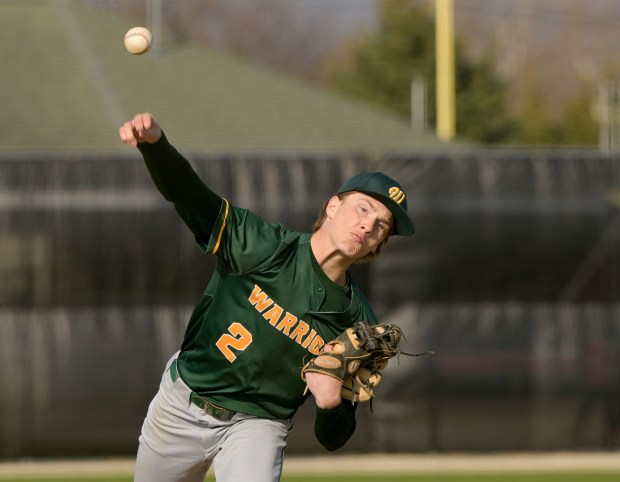 Waubonsie Valley's Owen Roberts (2) scoops up a bunt attempt against Batavia during a nonconference game in Batavia on Thursday, April 10, 2025. (Mark Black / The Beacon-News)