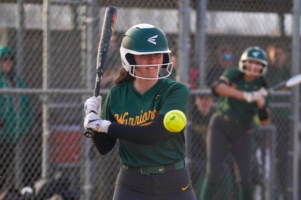 Waubonsie Valley's Riggs Grace takes a high pitch for a ball while batting against Metea Valley during a DuPage Valley Conference softball game at Metea Valley High School in Aurora on Thursday, April 10, 2025. (Sean King / for The Beacon-News)