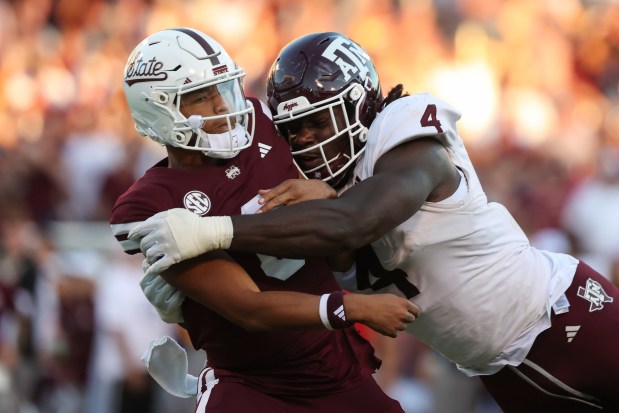 Texas A&M defensive lineman Shemar Stewart tackles Mississippi State quarterback Michael Van Buren Jr. on Oct. 19, 2024, in Starkville, Miss. (Randy J. Williams/AP)