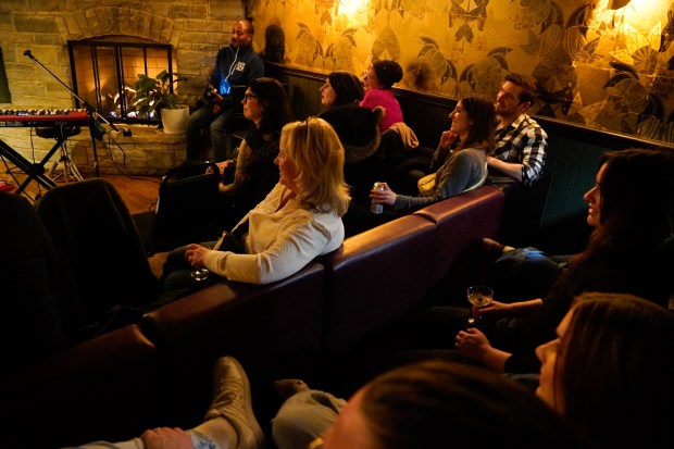 Attendees watch the "Welcome to the Show" variety show at The Getaway in Chicago on April 7, 2025. (Addison Annis/for the Chicago Tribune)