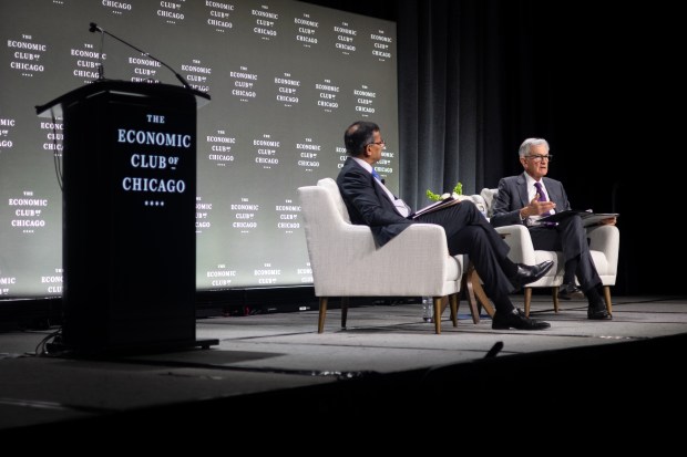 Federal Reserve Chair Jerome Powell, right, addresses the Economic Club of Chicago, alongside moderator Raghuram Rajan, a professor of finance at University of Chicago's Booth School, at a luncheon at the Hilton on April 16, 2025. (Audrey Richardson/Chicago Tribune)